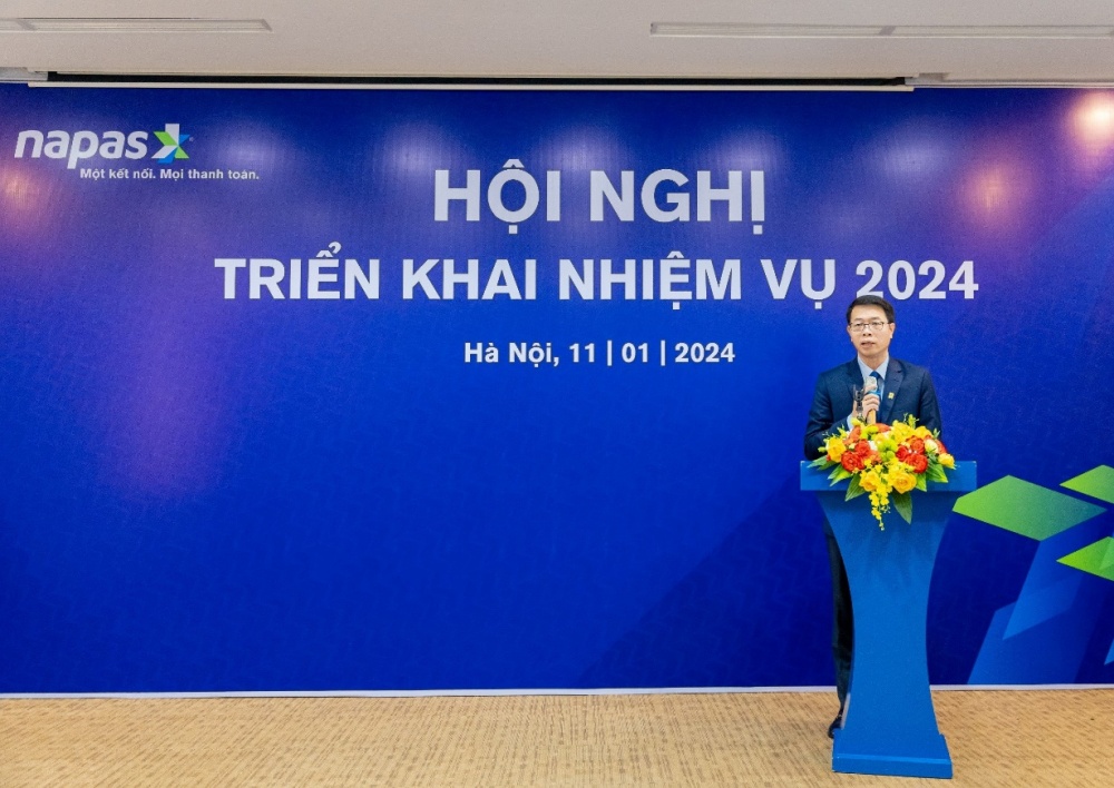 Ông Nguyễn Quang Hưng – Chủ tịch HĐQT NAPAS trình bày báo cáo kết quả hoạt động năm 2023 Ông Nguyễn Quang Hưng – Chủ tịch HĐQT NAPAS trình bày báo cáo kết quả hoạt động năm 2023