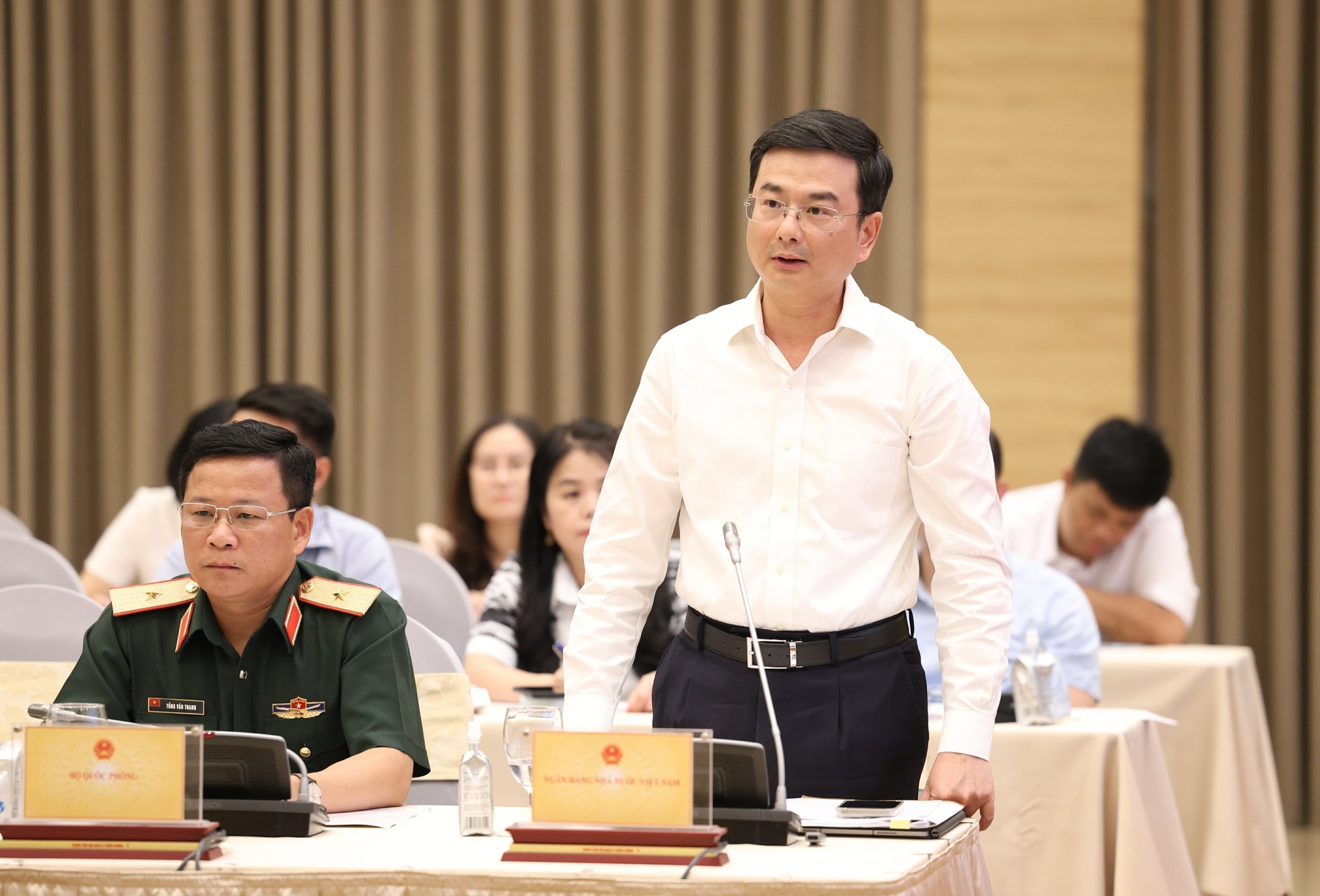 Phó Thống đốc NHNN Phạm Thanh Hà thông tin về định hướng chính sách tiền tệ tín dụng nhằm đạt được mục tiêu kiểm soát lạm phát, ổn định tế vĩ mô từ nay đến cuối năm - Ảnh: VGP