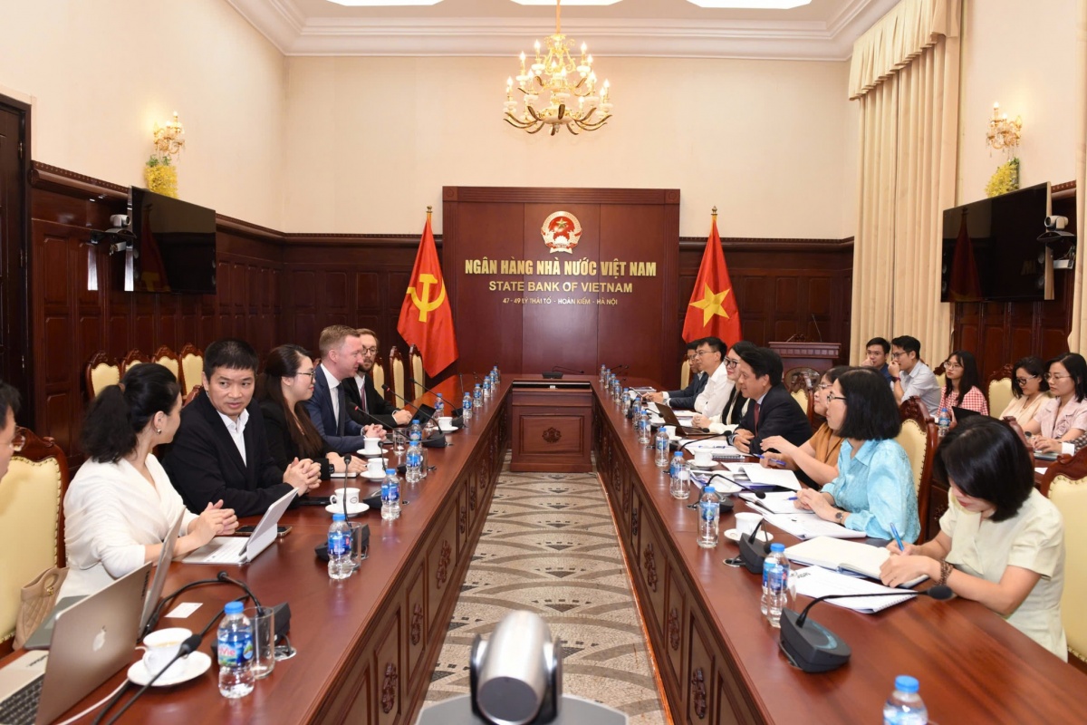 Phó Thống đốc Phạm Tiến Dũng tiếp Tập đoàn Công nghệ tài chính Tether