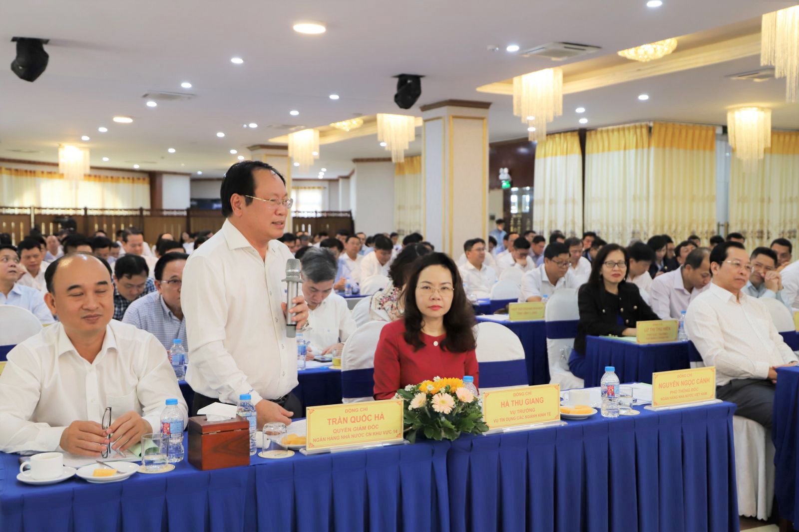 Ông Trần Quốc Hà, quyền Giám đốc NHNN chi nhánh Khu vực 14 phát biểu tại Hội nghị 