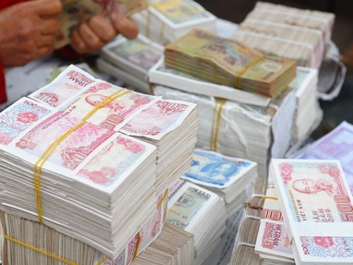 Không chi các loại tiền mới in còn nguyên seri từ 5.000 đồng trở xuống vào lưu thông
