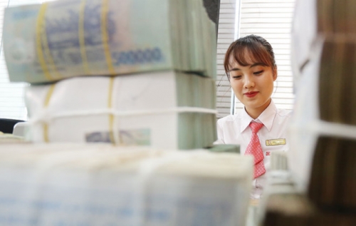 NHNN yêu cầu tập trung vốn tín dụng cho sản xuất, kinh doanh NHNN yêu cầu tập trung vốn tín dụng cho sản xuất, kinh doanh