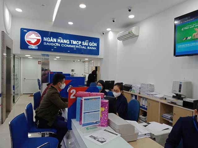 hinh anh giao dich ngan hang thoi dich virus corona
