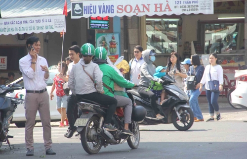 Grab cảnh báo tình trạng lợi dụng đồng phục GrabBike bắt khách