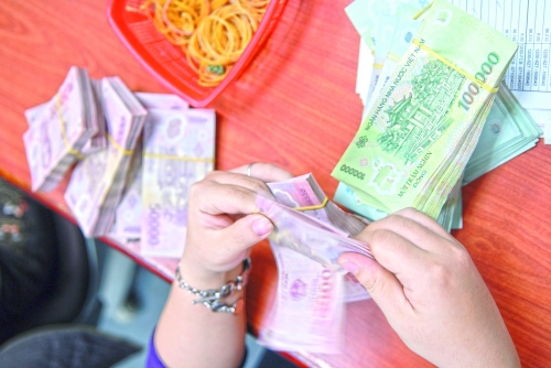 Cởi nút thắt xử lý nợ xấu