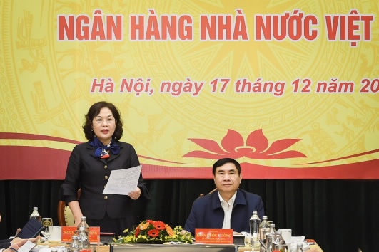 doan kiem tra cua bo chinh tri lam viec voi ban can su dang ngan hang nha nuoc