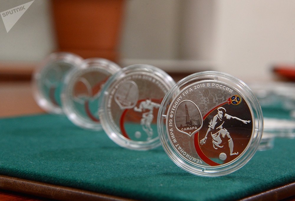 Đồng tiền kỷ niệm nóng cùng World Cup Đồng tiền kỷ niệm nóng cùng World Cup