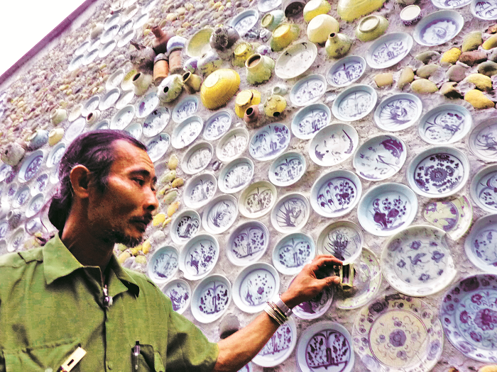 Lão nông mua cổ vật gắn lên… tường! lao nong mua co vat gan len tuong